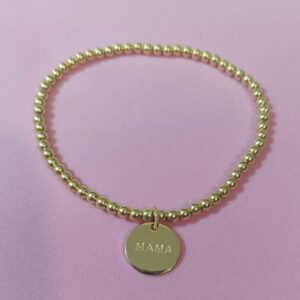 Pulsera elástica de bolitas plata rodiada y bañada en oro